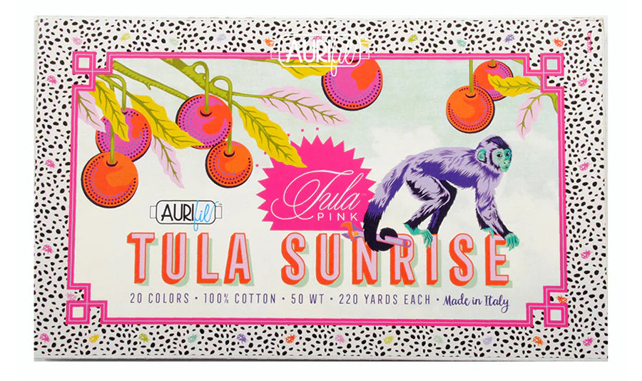 Aurifil Tula Pink Tula Sunrise thread kit packaging with colorful design and monkey illustration.