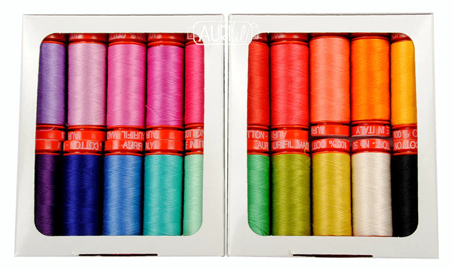 Two sets of colorful thread spools in open and closed boxes.