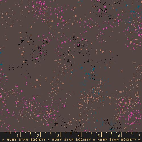 Fabric with colorful dot pattern on a brown background, featuring Ruby Star Society label.